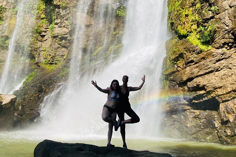 Tourist enjoying a waterfall adventure in the vicinity of Villas Azul Ballena