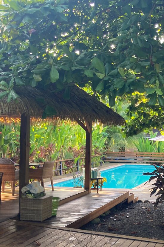 Refreshing outdoor pool surrounded by tropical vegetation at Villas Azul.