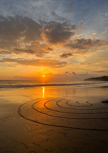Breathtaking sunset view from the beach at Villas Azul Ballena."